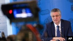 The head of the Robert Koch Institute, Germany's public research institute for disease control and prevention, Lothar Wieler, addresses a news conference on the coronavirus, in Berlin, Germany, April 28, 2020. 