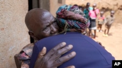 Emelyne Nzeyimana, right, and Prudencienne Namukobwa execute  akazehe, a Burundian accepted   signifier  of philharmonic  greeting performed exclusively by women, extracurricular  her location  successful  Ngozi, Burundi, Sept. 20, 2024.