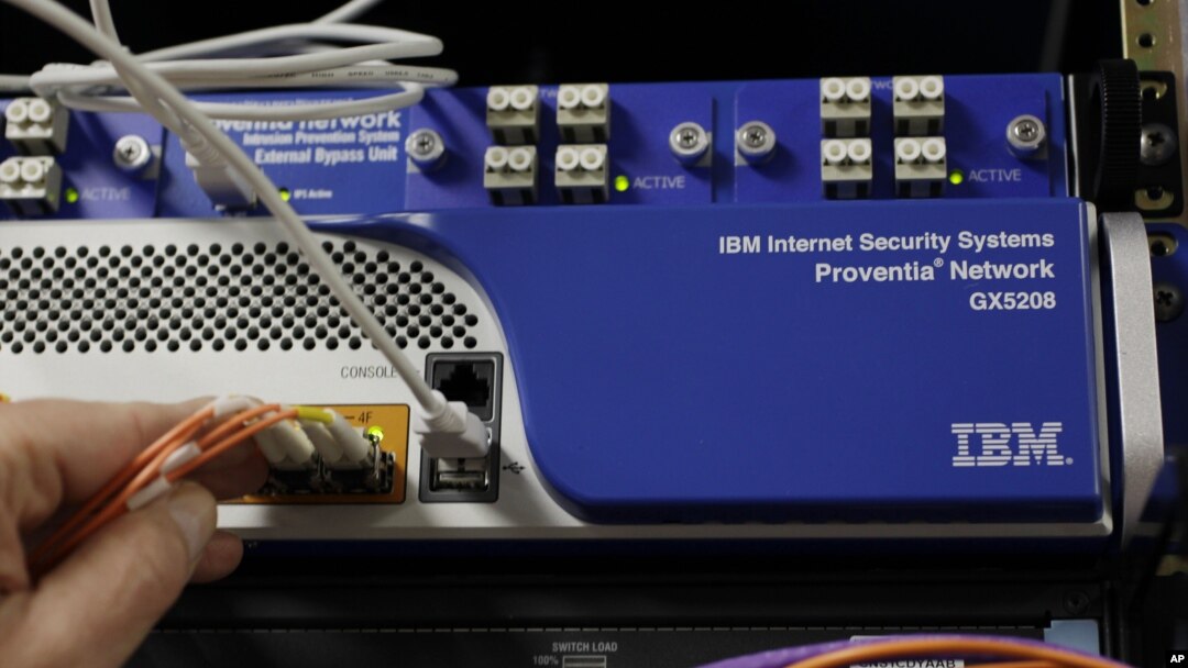 A scientist uses an IBM Internet Security Systems Proventia Network at the IBM Alamden Research Center in San Jose, California, USA, April 18, 2011. 