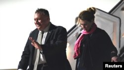 US Secretary of State Mike Pompeo and his wife Susan arrive at Munich International Airport, Germany, Feb. 13, 2020. 