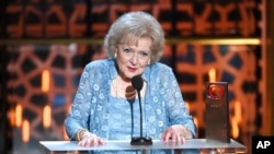 FILE - Betty White accepts the legend award at the TV Land Awards at the Saban Theatre, in Beverly Hills, April 11, 2015.