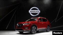 FILE - The 2018 Nissan Rogue is displayed at the 2017 New York International Auto Show in New York City, April 12, 2017. 