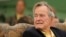 Former President George H.W. Bush attends a ceremony to unveil a new garden named in his wife's honor, Sept 29, 2011, in Kennebunkport, Maine.