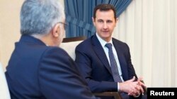 Prezident Bashar al-Assad Eron qonunchilari bilan uchrashuvda