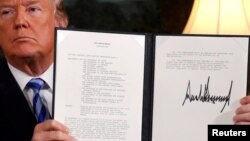 U.S. President Donald Trump holds a proclamation declaring his intention to withdraw from the JCPOA Iran nuclear agreement at the White House in Washington, May 8, 2018. Analysts say leaving the Iran nuclear deal is unlikely to derail momentum to reach a deal with North Korea. 
