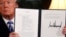 U.S. President Donald Trump holds a proclamation declaring his intention to withdraw from the JCPOA Iran nuclear agreement at the White House in Washington, May 8, 2018. Analysts say leaving the Iran nuclear deal is unlikely to derail momentum to reach a deal with North Korea. 