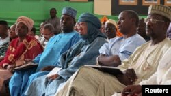 Political figures from northern Mali listen as Mali's Prime Minister Cheick Modibo Diarra speaks at a meeting in Bamako, August 10, 2012. 