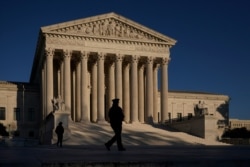 The Supreme Court is seen at sundown on the eve of Election Day, in Washington, Monday, Nov. 2, 2020.