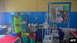 A medical staff checks the equipment inside a hospital ward which will be used in treating COVID-19 patients at the Siliguri District Hospital in Siliguri, India, on May 19, 2021.