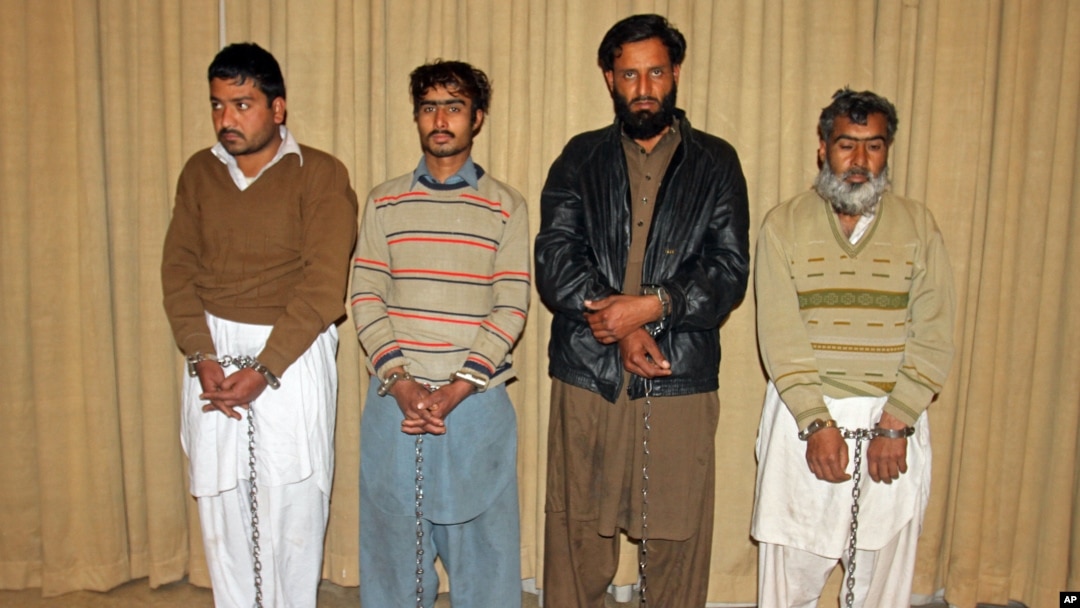 Pakistanis accused of being the facilitators of the deadly attack on a university are presented to the media, in Peshawar, Pakistan, Jan. 23, 2016.