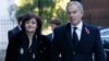 FILE - Former British Prime Minister Tony Blair and his wife Cherie arrive for the annual Remembrance Sunday ceremony at the Cenotaph, in central London, November 2013.