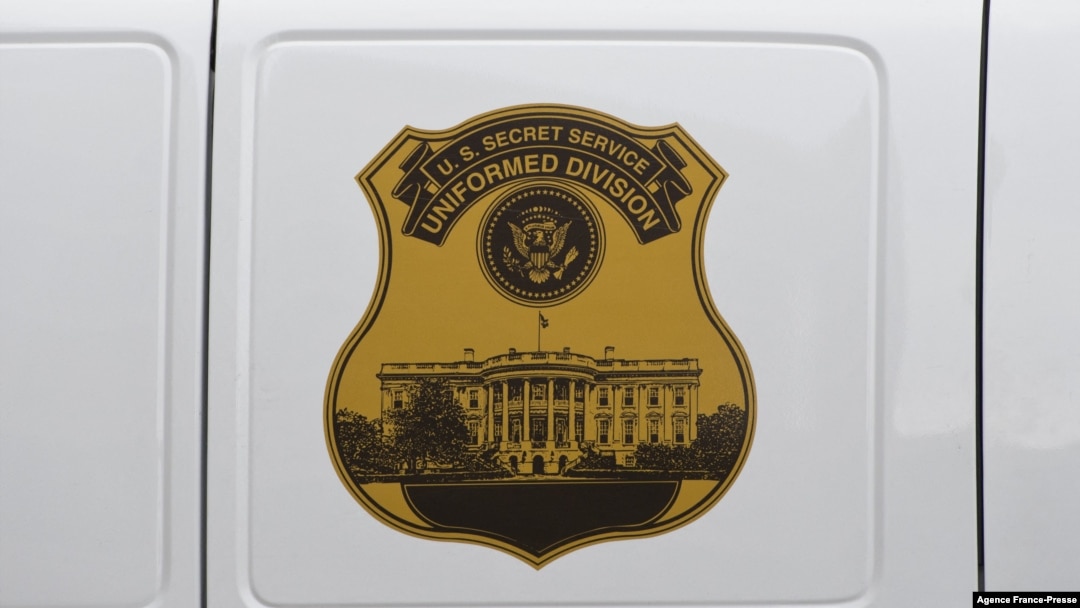 FILE - The seal of the U.S. Secret Service Uniformed Division is seen on the side of a vehicle in Washington, D.C., Oct. 2, 2014.
