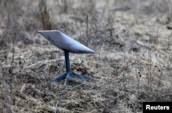 FILE—A Starlink satellite internet system is set up near the frontline town of Bakhmut in Ukraine, March 8, 2023.