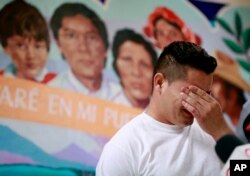 FILE—In this June 25, 2018 file photo, Christian, from Honduras, recounts his separation from his child at the border during a news conference at the Annunciation House,in El Paso, Texas.