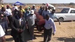 Mourners Gather at Burial of Wife, Mother of Two, Killed in Zimbabwe's Post-Election Violence