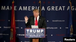 FILE - U.S. Republican presidential candidate Donald Trump speaks to supporters at a Pearl Harbor Day rally aboard the USS Yorktown Memorial in Mount Pleasant, South Carolina, Dec. 7, 2015.