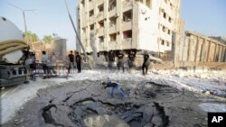 Opposition supporters affected by tear gas reacts during a rally against Venezuelan President Nicolas Maduro&#39;s government in Caracas, July 9, 2017.