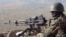 FILE - A Cameroonian soldier guards an observation post on a hill in the Mandara Mountain chain in Mabass overlooking Nigeria, northern Cameroon, Feb. 16, 2015. 