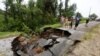 Velika rupa na putu nakon što je uragan Debby pogodio Floridu. (Foto: REUTERS/Octavio Jones)