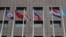 A pole, third from right, where Nauru national flag used to fly is vacant outside the Diplomatic Quarter building in Taipei, Taiwan, Monday, Jan. 15, 2024. The Pacific Island nation of Nauru says it is switching diplomatic recognition from Taiwan to China. 