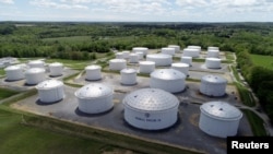 Holding tanks are seen in an aerial photograph at Colonial Pipeline's Dorsey Junction Station in Woodbine, Maryland, U.S. May 10, 2021. (REUTERS/Drone Base)