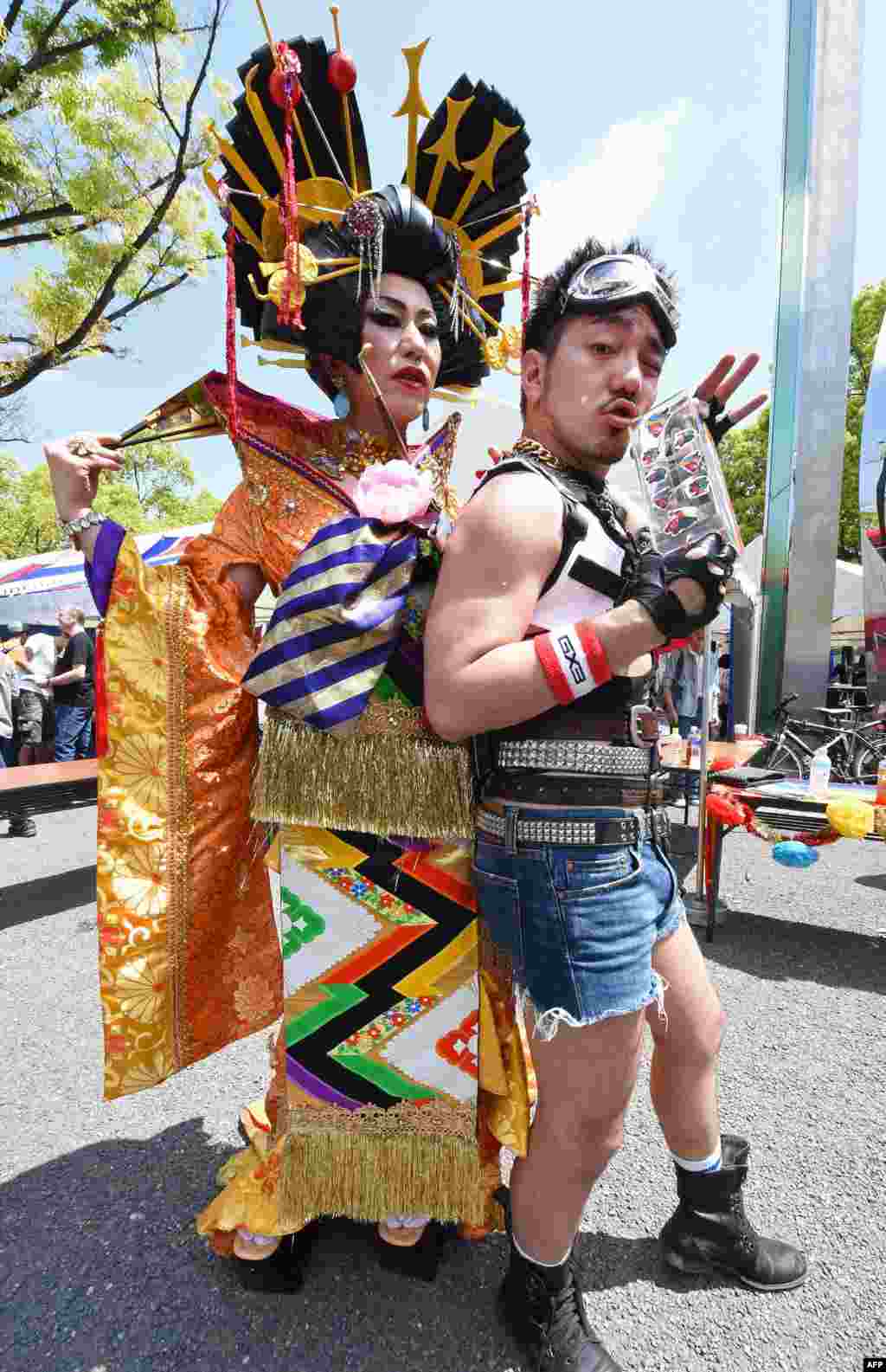 Participants of the Tokyo Rainbow Pride 2015 pose for photographers before their parade in Tokyo, Japan.