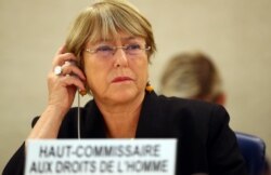 FILE - U.N. High Commissioner for Human Rights Michelle Bachelet attends a session of the Human Rights Council at the United Nations in Geneva, Switzerland, Sept. 9, 2019.