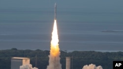 FILE - In this image provided by the European Space Agency, Europe’s new rocket Ariane 6 launches from Kourou, French Guiana, Tuesday, July 9, 2024. (Stephane Corvaja/European Space Agency via AP)