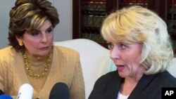 Heather Kerr, right, a former actress who alleges that entertainment mogul Harvey Weinstein sexually abused her in 1989, speaks with her attorney Gloria Allred at a news conference in Los Angeles, Oct. 20, 2017.