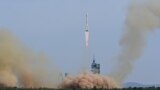 A Long March-2F carrier rocket, carrying the Shenzhou-16 spacecraft and three astronauts, takes off from the launching area of Jiuquan Satellite Launch Center for Tiangong space station, near Jiuquan, Gansu province, China May 30, 2023. China Daily via REUTERS 