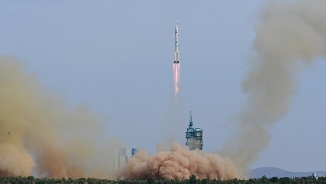 A Long March-2F carrier rocket, carrying the Shenzhou-16 spacecraft and three astronauts, takes off from the launching area of Jiuquan Satellite Launch Center for Tiangong space station, near Jiuquan, Gansu province, China May 30, 2023. China Daily via REUTERS