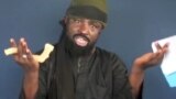 Abubakar Shekau shugaban kungiyar Boko Haram yayinda yake magana a sabon faifan bidiyon da ya fitar.