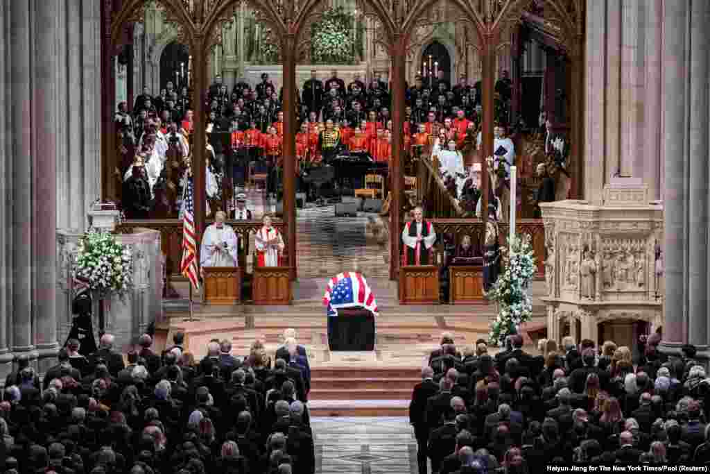 The casket of former President Jimmy Carter arrives at the National Cathedral in Washington, for a procession before the funeral, Jan. 9, 2025. 