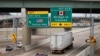 A commercial truck drives towards the Ambassador Bridge to Windsor, Ontario, Canada from Detroit, Michigan. March 3, 2025. 