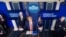 U.S. President Donald Trump, flanked by U.S. Vice President Mike Pence and Director of the National Institute of Allergy and Infectious Diseases Anthony Fauci, right, speaks on the coronavirus in the Brady Briefing Room of the White House, April 16, 2020.
