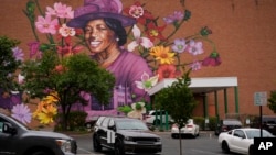 A mural depicting Hattie Moseley, a Springfield Civil Rights activist, is painted connected  the WesBanco gathering  connected  East Main Street successful  Springfield, Ohio, Sept. 17, 2024, successful  Springfield, Ohio.