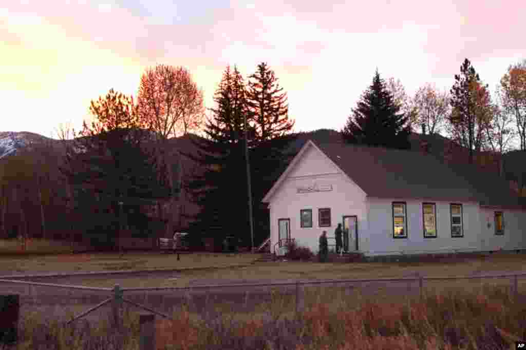 The first Election Day voter of the morning enters Springhill School in Belgrade, Montana. Springhill School is the polling station for Precinct 17, a place where ranchers, affluent professionals and retirees alike live and vote.