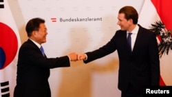 Austrian Chancellor Sebastian Kurz welcomes South Korea's President Moon Jae-in for a meeting in Vienna, Austria, June 14, 2021. 