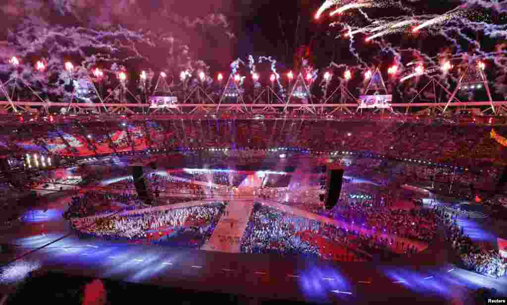 Fireworks explode during the closing ceremony of the London 2012 Olympic Games at the Olympic Stadium August 12, 2012.