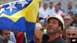 Bosnian worker chants slogans during protest in Bosnian capital of Sarajevo, July 30, 2015. 