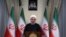 In this photo released by official website of the office of the Iranian Presidency, President Hassan Rouhani addresses the nation in a televised speech in Tehran, Iran, May 8, 2018. 