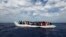 Off the Libyan coast, 104 sub-Saharan Africans in a rubber dinghy await rescue. The charity Migrant Offshore Aid Station provided this courtesy photo Oct. 4, 2014. 
