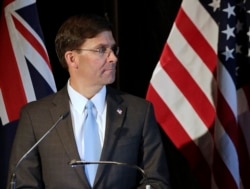 FILE - U.S. Secretary of Defense Mark Esper briefs the media in Sydney, Australia, Aug. 4, 2019.