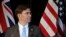FILE - U.S. Secretary of Defense Mark Esper briefs the media following annual bilateral talks with Australian counterparts in Sydney, Australia, Aug. 4, 2019. 