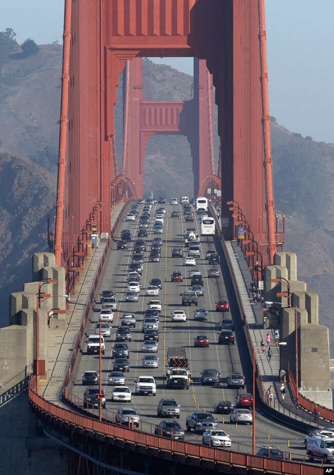 FILE - Traffic flows over the Golden Gate Bridge in San Francisco in this Sept. 19, 2013 file photo