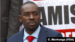 Nelson Chamisa, the leader of the Movement for Democratic Change Alliance, listens as a journalist asks a question, Aug. 4, 2108 in Harare, Zimbabwe.