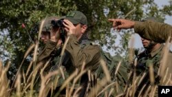 FILE - Israeli troops take part in a drill in northern Israel.