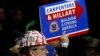 Supporters for Democratic presidential candidate Hillary Clinton listen as she speaks during a rally in New York on March 2, 2016. 