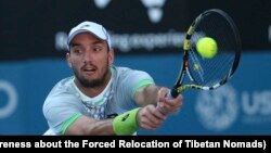 Victor Troicki of Serbia in his match against Gilles Muller of Luxembourg at the Sydney International Tennis tournament