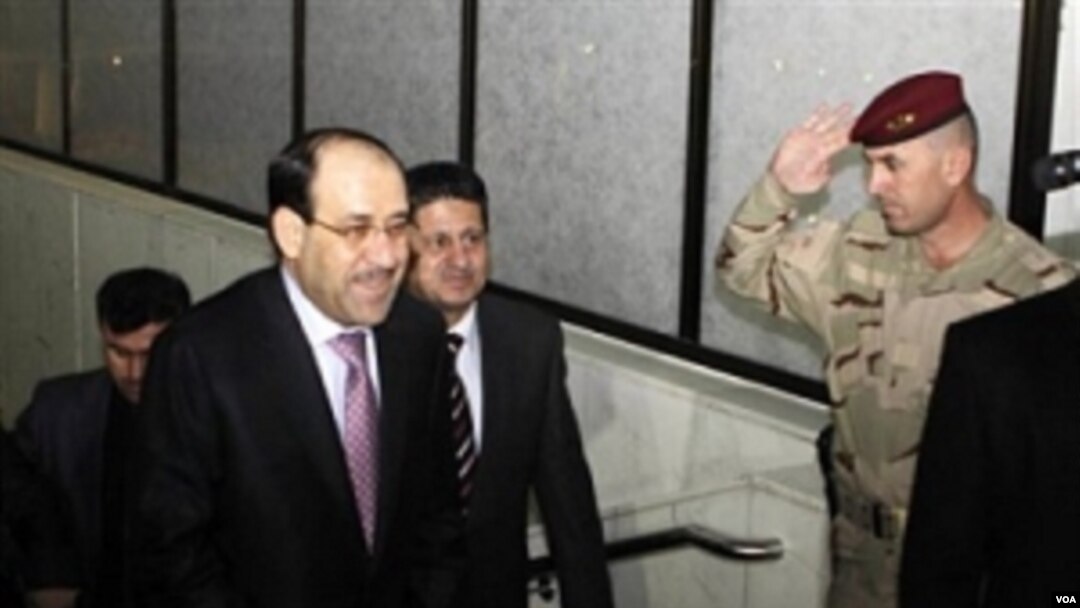 Perdana Menteri Nouri al-Maliki datang menghadiri rapat parlemen Irak di Baghdad, Irak, Senin, 20 Desember 2010.